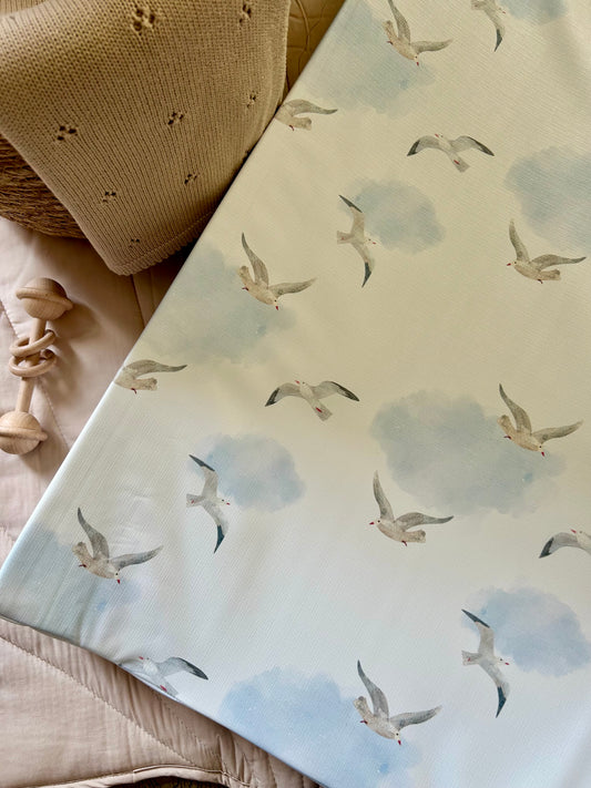 Seagulls Amongst The Clouds Anti - Roll Wedge Changing Mat