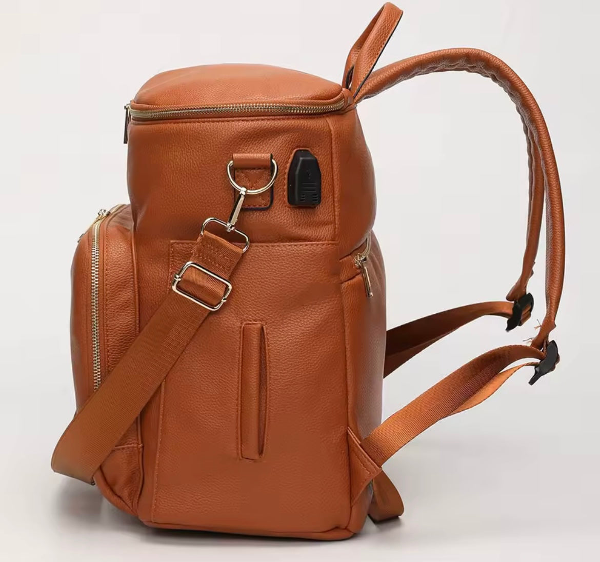 Vegan leather baby changing bag with accessories